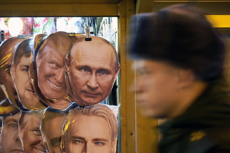 face masks depicting Donald Trump and Vladimir Putin at a souvenir shop in St. Petersburg, Russia