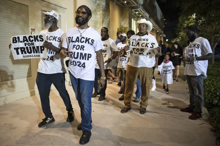 Members of "Blacks For Trump"