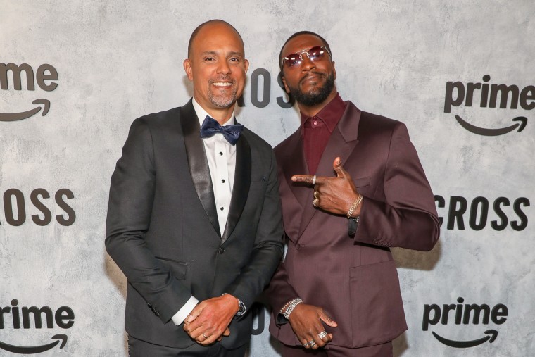 Ben Watkins, left, and Aldis Hodge pose together on the red carpet