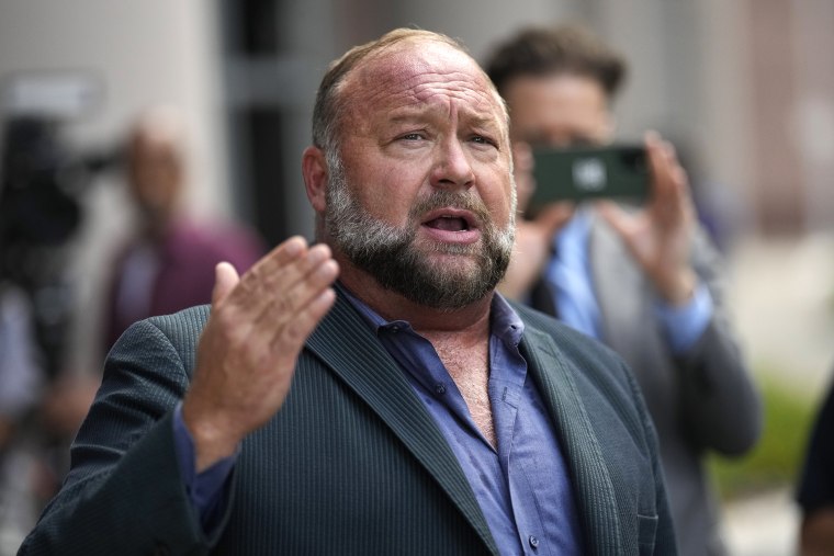 Alex Jones speaks to the media