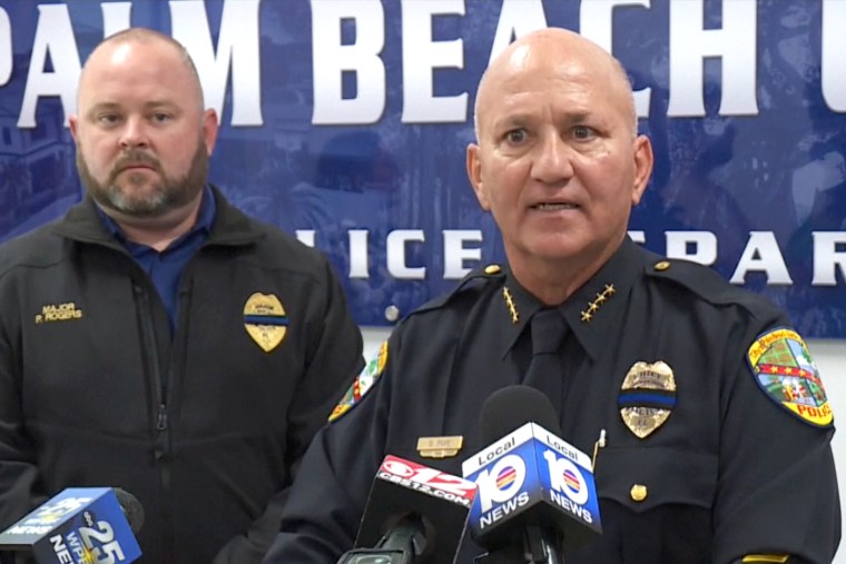 Police Chief Dominick Pape provides information about the murder at Sandhill Crane Golf Club, in Palm Beach Gardens, Fla., on Tuesday.