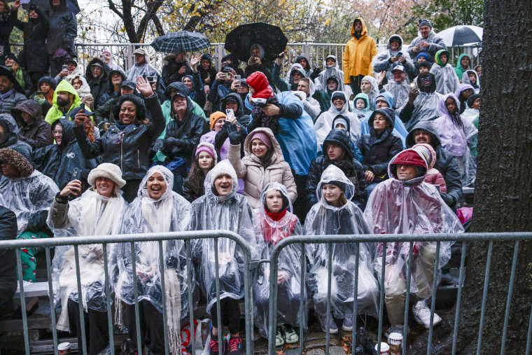 People watch the parade.