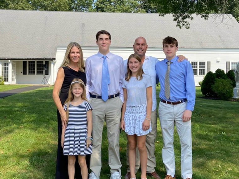 Elaine and Scott Conley with their four children.