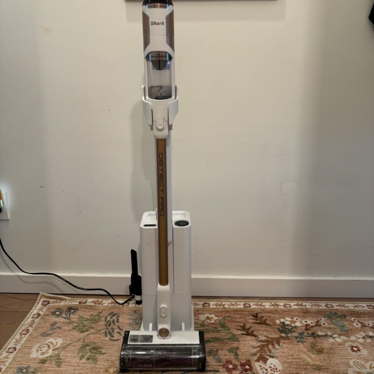 Detect vacuum standing upright on the floor.