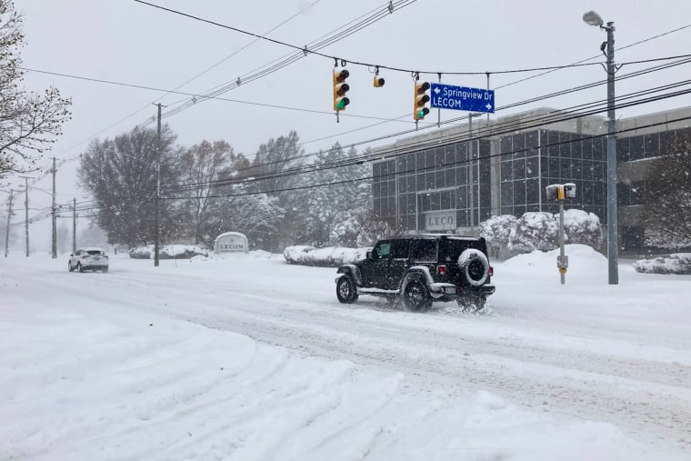 A jeep on a snowy road