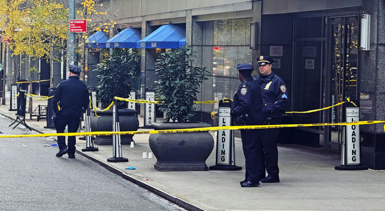 Police at the scene of a shooting at the Hilton in Midtown Manhattan on Dec. 4, 2024. 