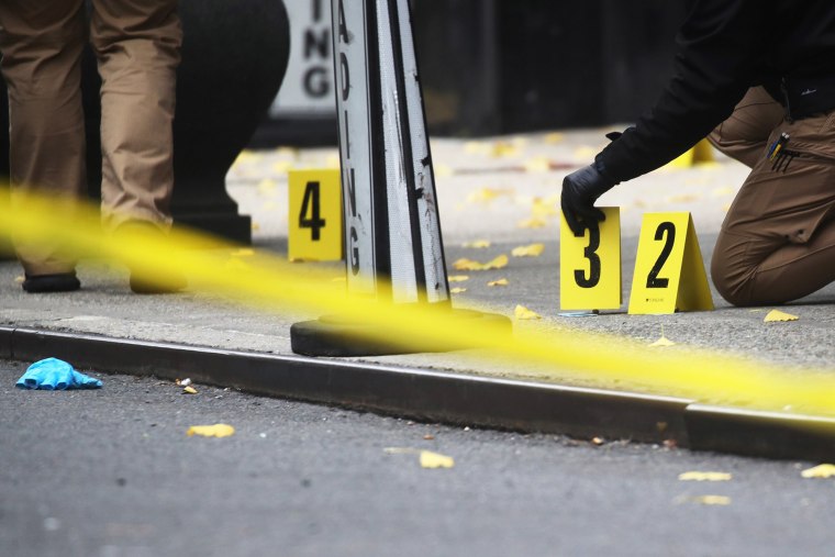 Police have placed a bullet marker outside the Midtown Manhattan Hilton Hotel where United Healthcare CEO Brian Thompson was shot and killed on December 4, 2024.