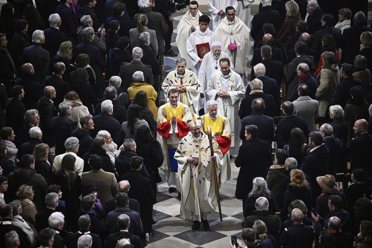 The Archbishop of Paris Laurent Ulrich leaves after the consecration 