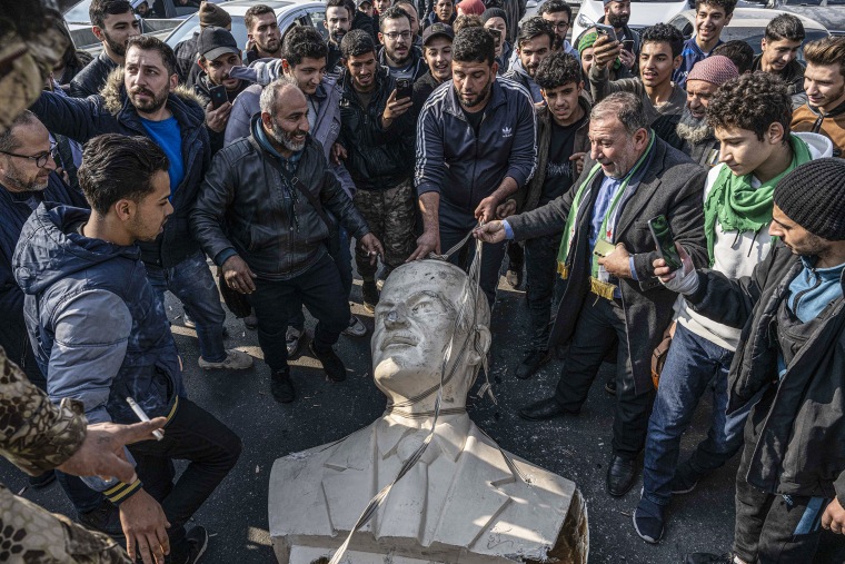 Statues of Hafez al-Assad toppled by people in Syria