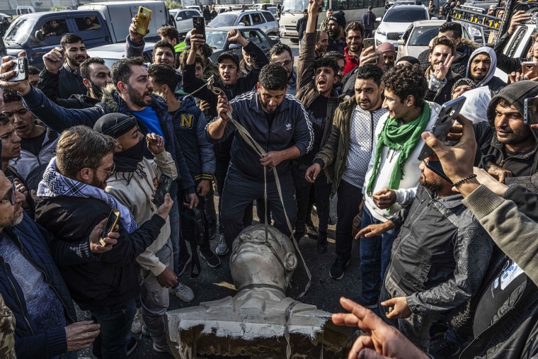 Statues of Hafez al-Assad toppled by people in Syria