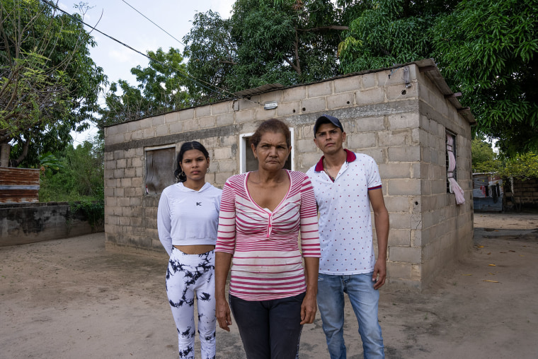 Arelis Coromoto Villegas with her son, Yohandry, and daughter Auribel.