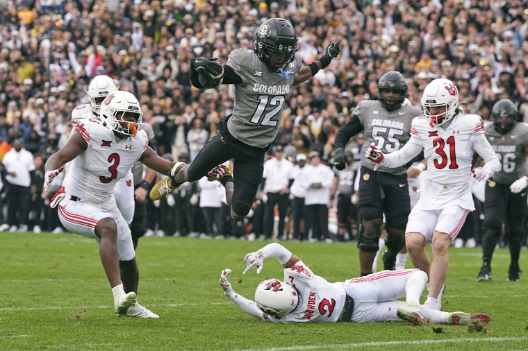 Colorado wide receiver Travis Hunter flies in for a touchdown against Utah on Nov. 16, 2024, in Boulder, Colo.