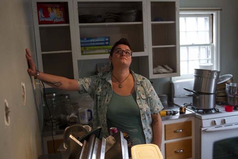 Angela Pike in her unfinished upstairs kitchen in Louisville, Ky.