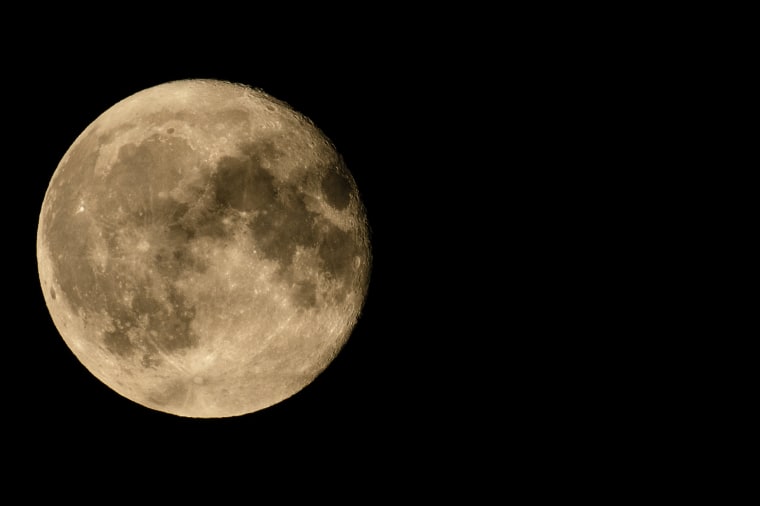 Super Moon In August Shines In The Night Sky of Turin