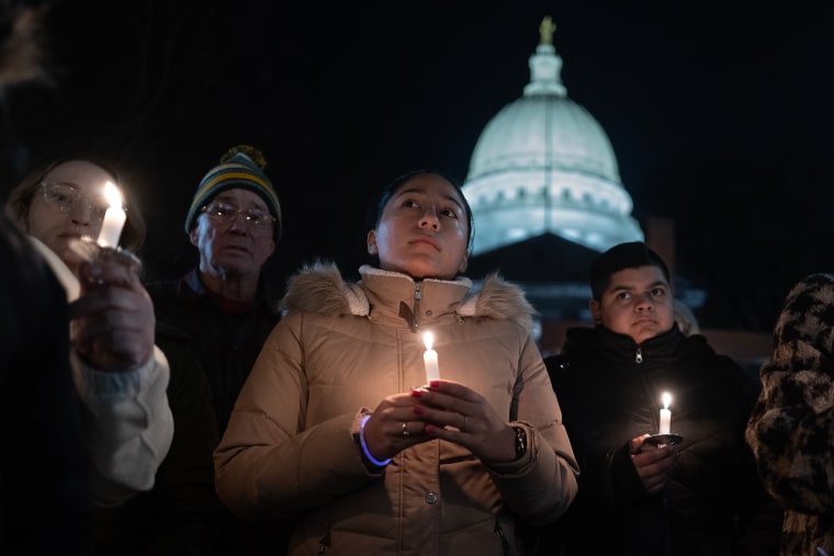 A vigil on the grounds of the Wisconsin State Capital on Tuesday to mourn the victims of the shooting at Abundant Life Christian School in Madison. 