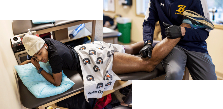 Quincy Wilson gets his legs massaged before track practice at the Bullis School on December 5, 2024 in Potomac, MD.