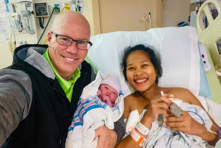 Warren Walborn and his wife, Leizel Ann, after the delivery of their daughter Sophie in 2021.