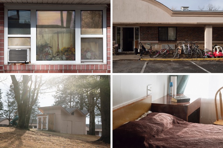 A quad showing a motel window, bicycles outside a door, a community refrigerator and a bed in a motel room.