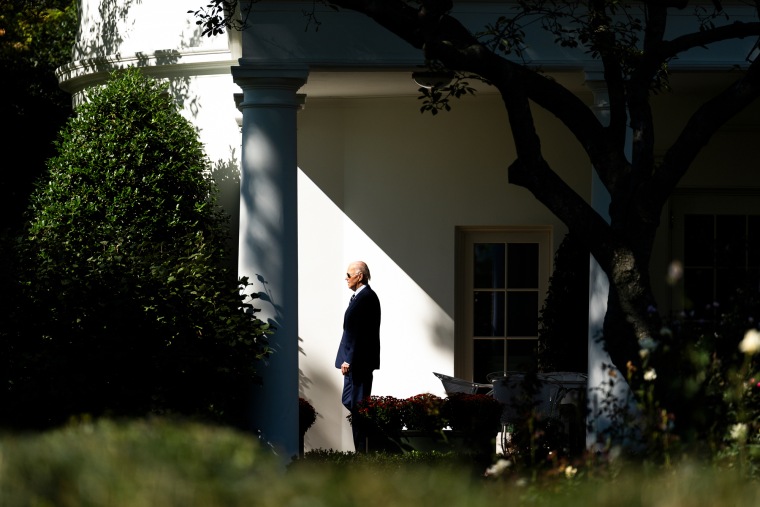 President Biden exits the White House ouside