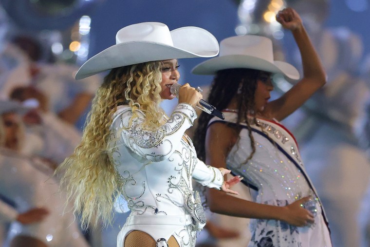 Beyoncé performs with daughter, Blue Ivy, during the halftime show for the game between the Baltimore Ravens and the Houston Texans at NRG Stadium on Dec. 25, 2024 in Houston, Texas.