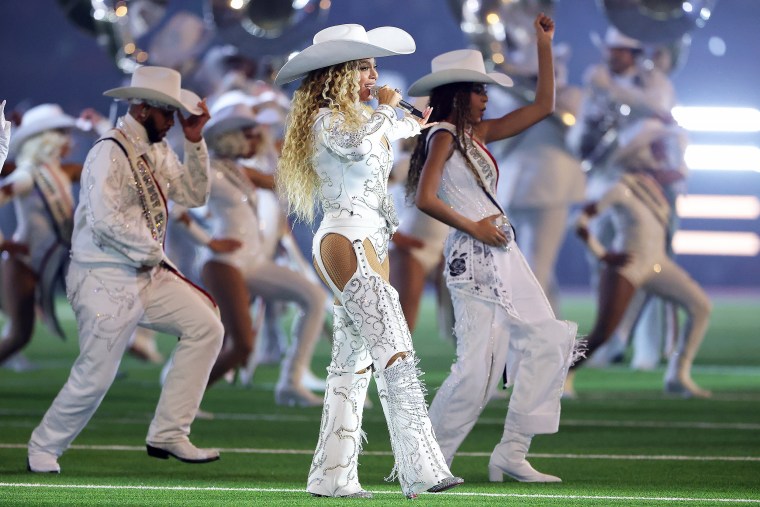 Beyoncé performs with daughter, Blue Ivy, during the halftime show.