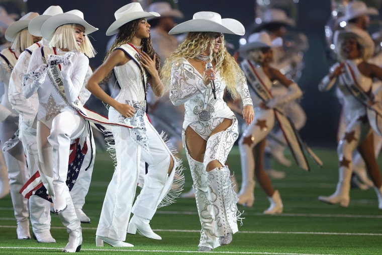 Beyoncé performs with daughter, Blue Ivy, during the halftime show.