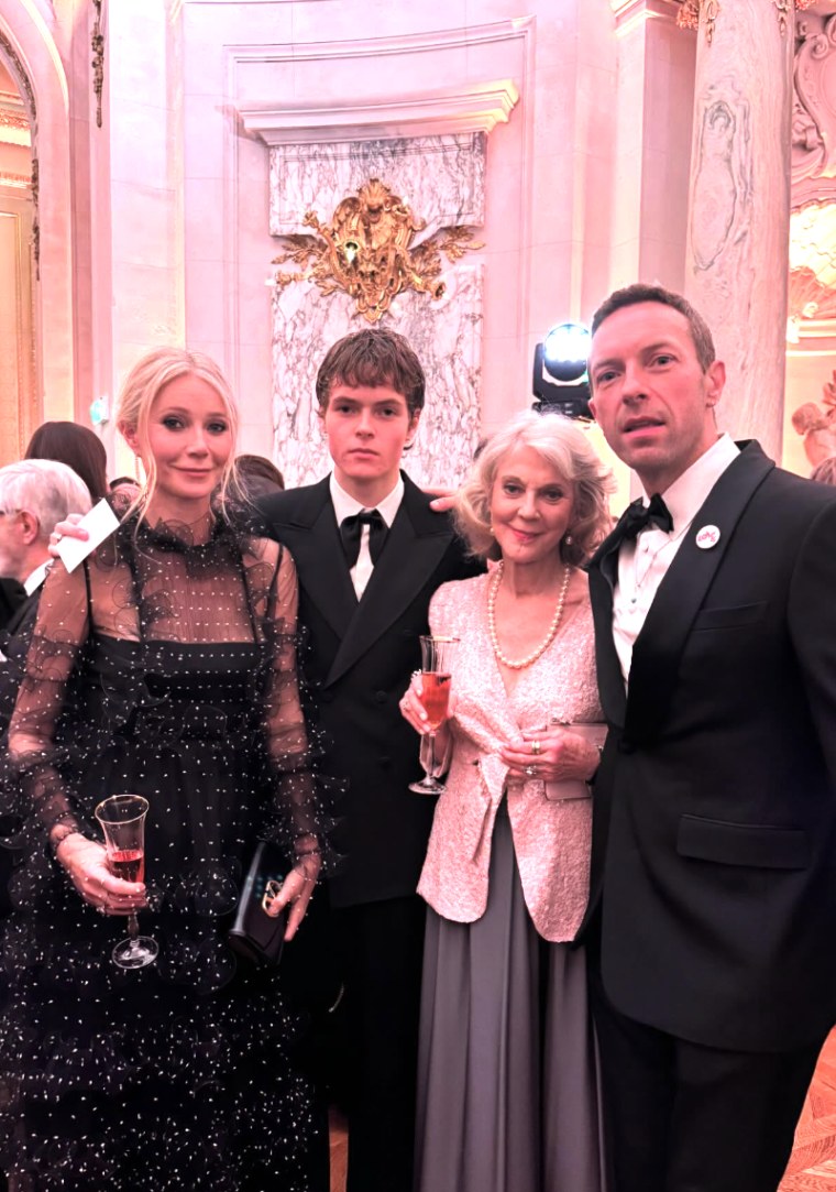 Gwyneth Paltrow and Chris Martin attend their daughter's debutante ball with son Moses and mom Blythe Danner.