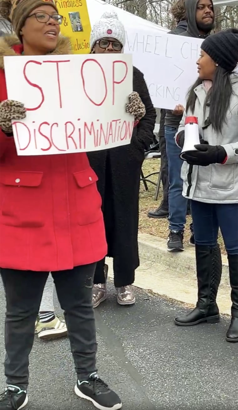 Protesters gather outside of a Cracker Barrel in Waldorf, Maryland on Dec. 15.