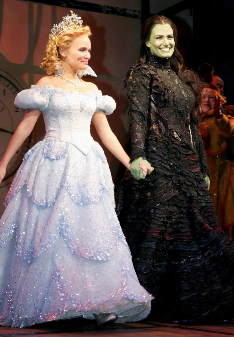 Kristin Chenoweth and Idina Menzel at curtain call for "Wicked" on October 30, 2003.