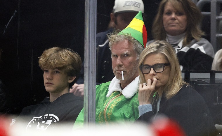 Will Ferrell at an NBA game dressed as Elf.