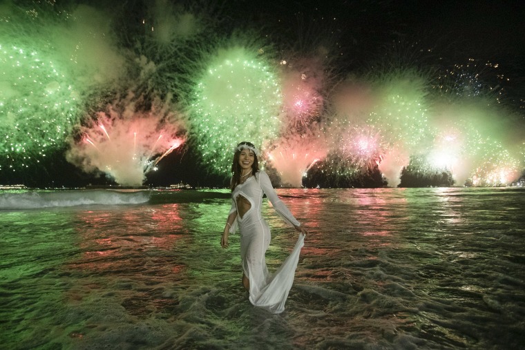 Fireworks light up the sky over Copacabana Beach in Rio de Janeiro.