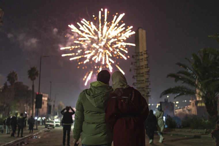 Syrians celebrate the new year in Damascus, Syria, Tuesday, Dec. 31, 2024. 