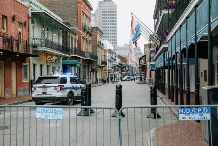 A police vehicle blocks access to Bourbon Street in New Orleans