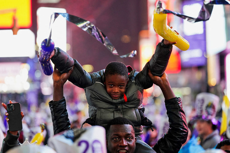 The crowd gathered to watch the ball drop at Times Square on New Year's Eve, in New York City, U.S., December 31, 2024. 