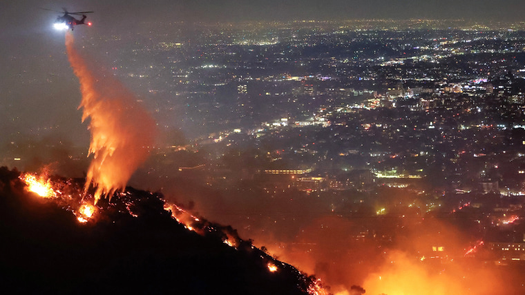  Powerful Winds Fuel Multiple Fires Across Los Angeles Area firefighting helicopter