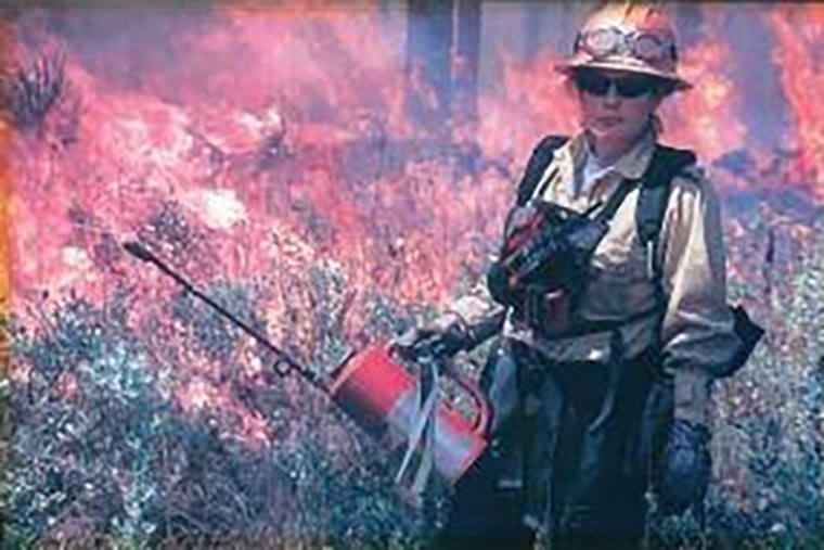 female woman firefighter