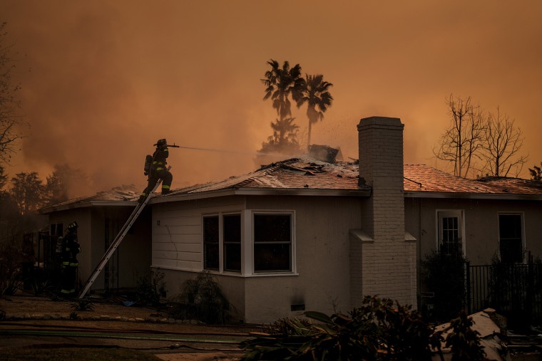 Fire crews battle the Eaton Fire