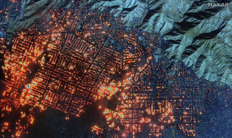 Maxar shortwave infrared closer satellite image of burning buildings in Altadena, California. 