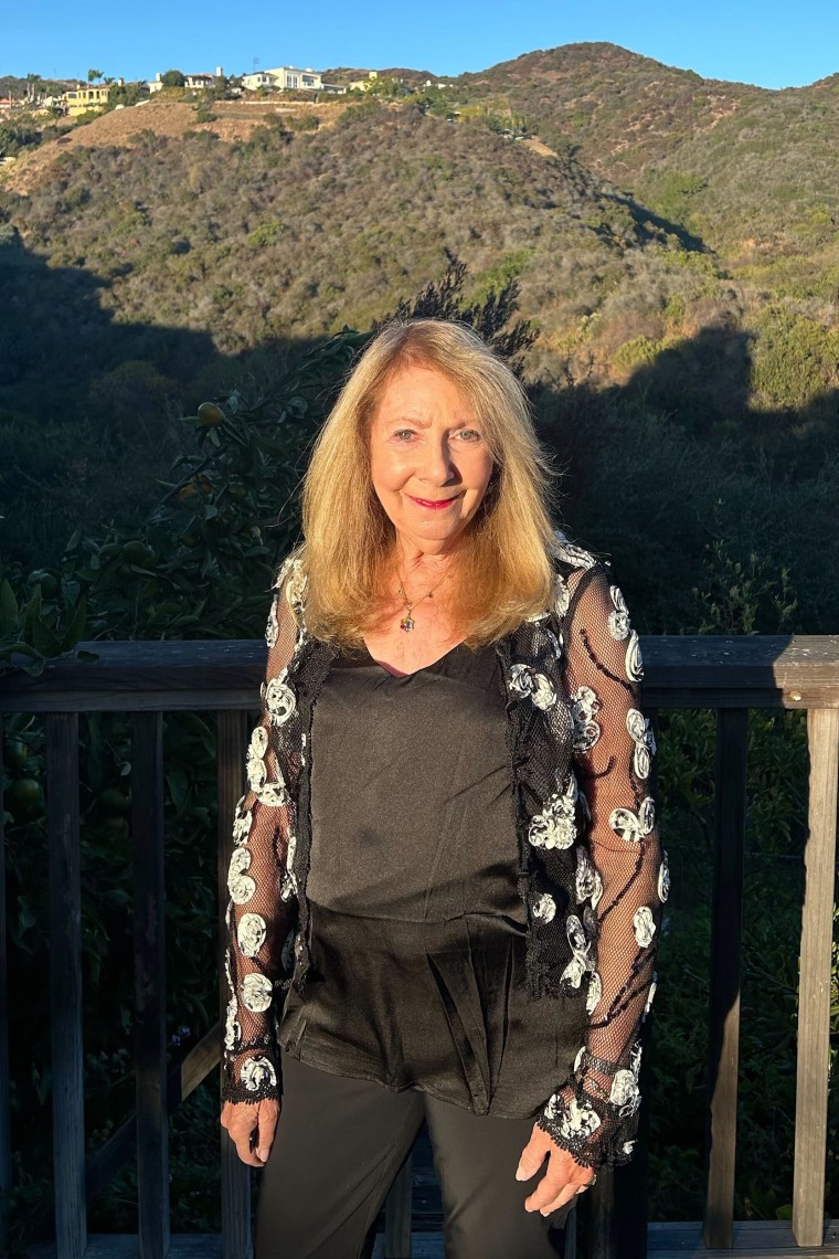 Francine Sohn at her home with the canyon behind her.