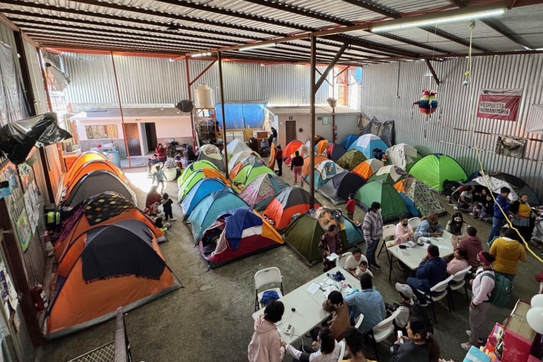 Tents inside the Movimiento Juventud 2000 in Tijuana, Mexico.  Some families have been living in those tents for months waiting for an appointment to cross over into the U.S.