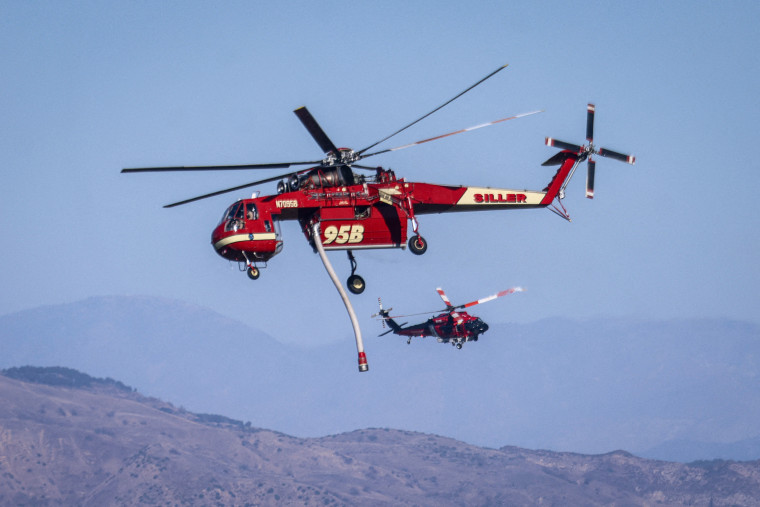 Helicopter ready to spray water.