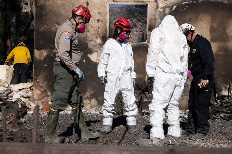 A search and rescue team works in Altadena, Calif., on Jan. 14, 2025.