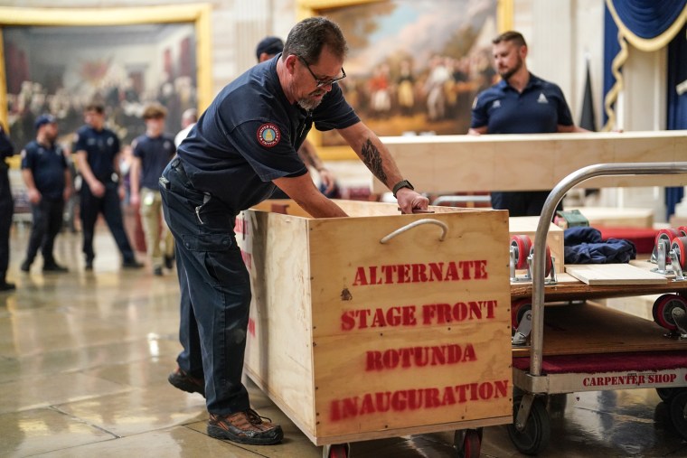 Workers prepare the U.S. Capitol rotunda for President-elect Donald Trump's 2nd term inauguration Jan. 17, 2025