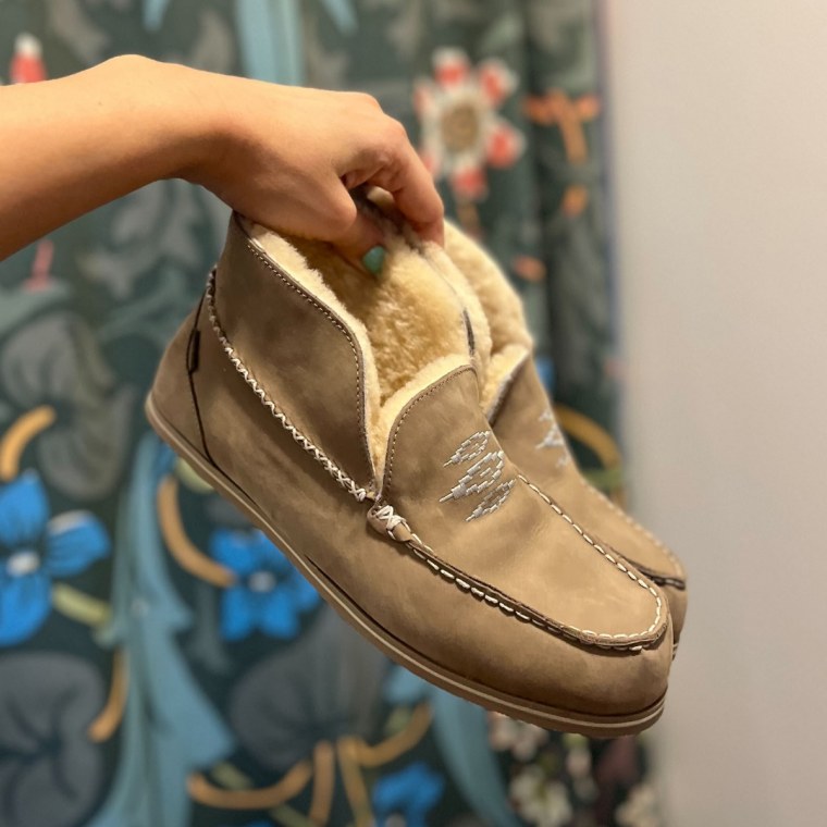 Commerce writer Jannely Espinal wearing her Hari Mari Alta Slippers.