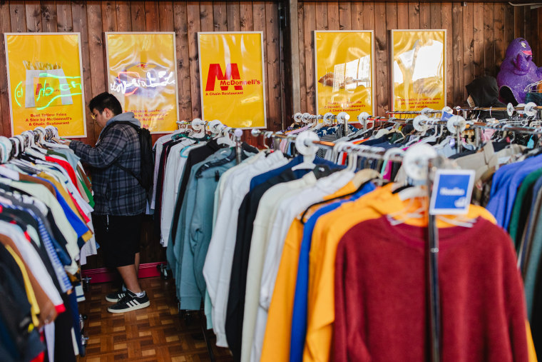 People browse for clothes to buy.