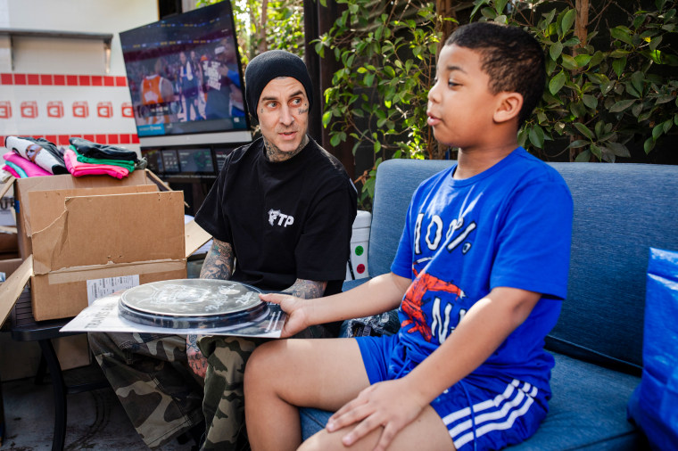 Travis Barker speaks to Grayson Roberts.