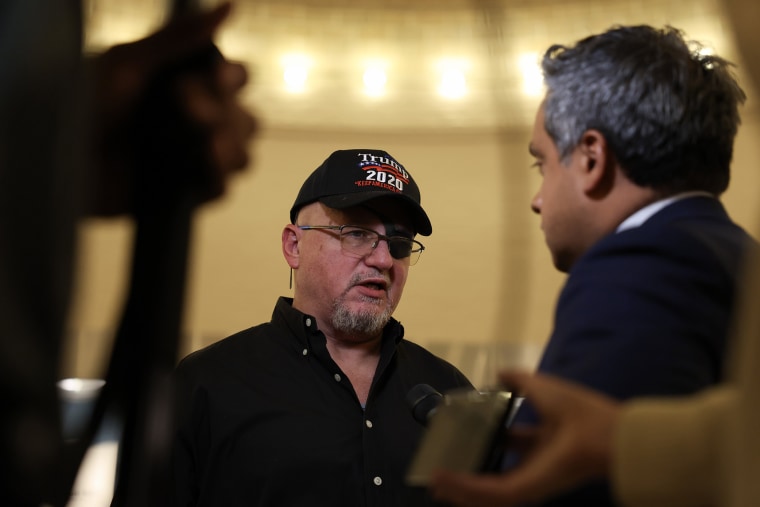 Oath Keepers founder Stewart Rhodes speaks to reporters in the Cannon House Office Building on Jan. 22, 2025.