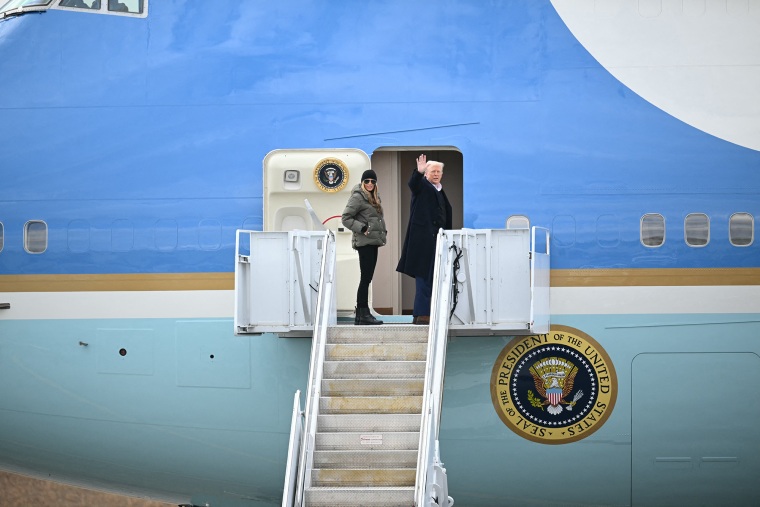 President Donald Trump and first lady Melania Trump board Air Force One