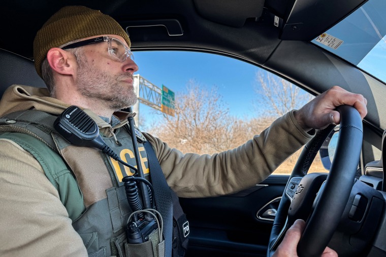 Sam Olsen, the Enforcement and Removal Operations Chicago field office director, drives a car.