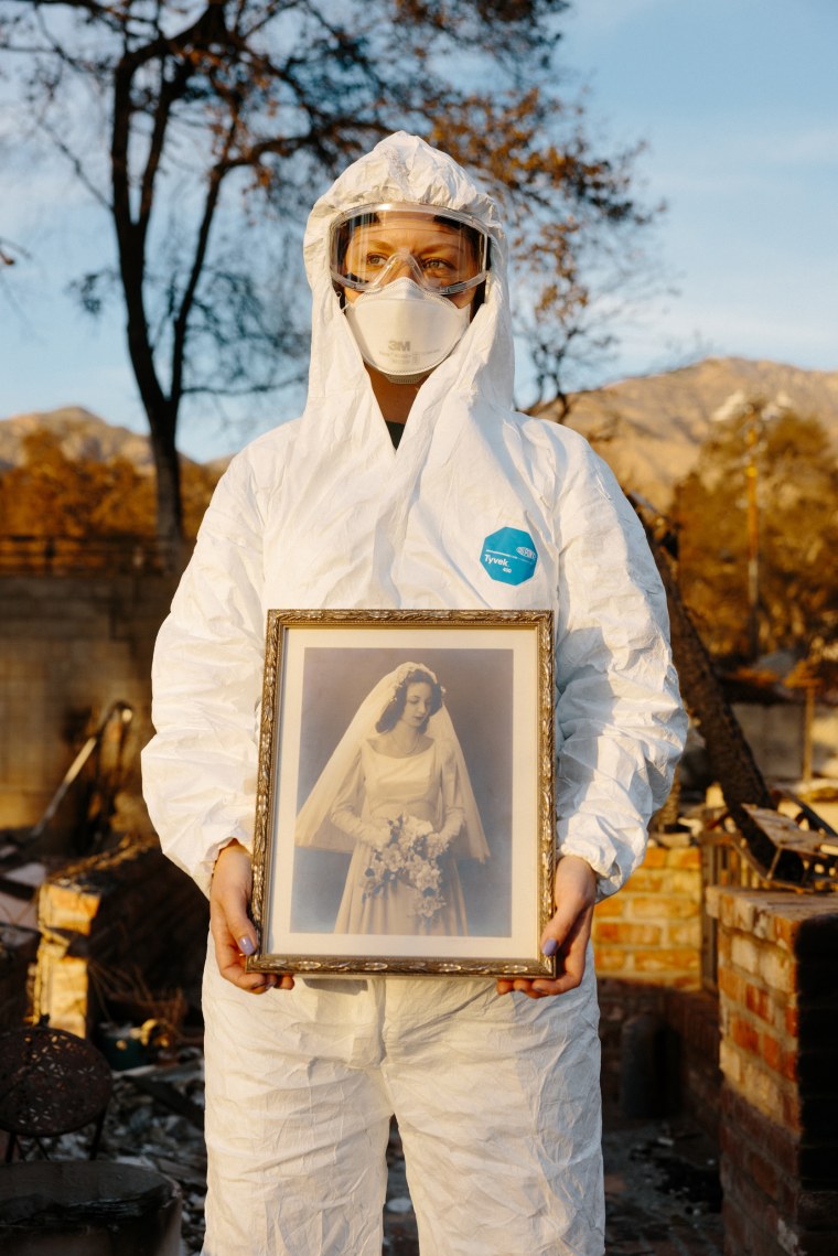 Courtney holds a photo of her grandmother 